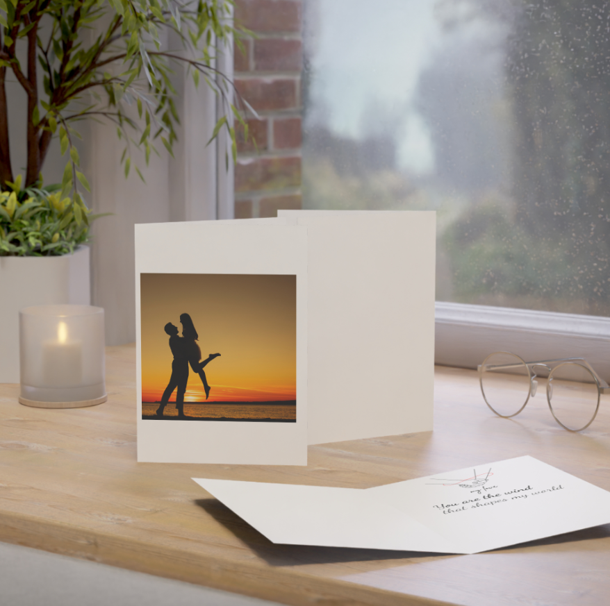 Greeting Cards - Couple on the beach at sunset